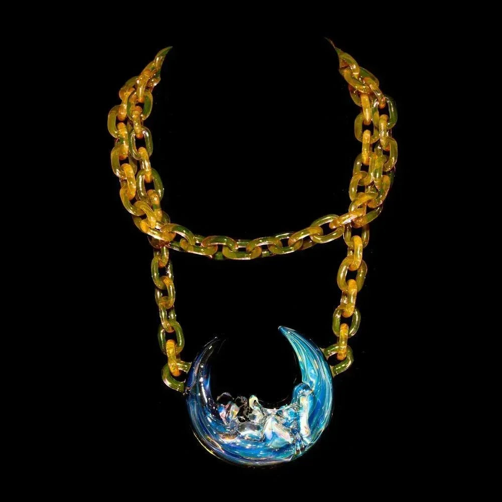 Handcrafted glass chain necklace with iridescent crescent moon pendant on black background