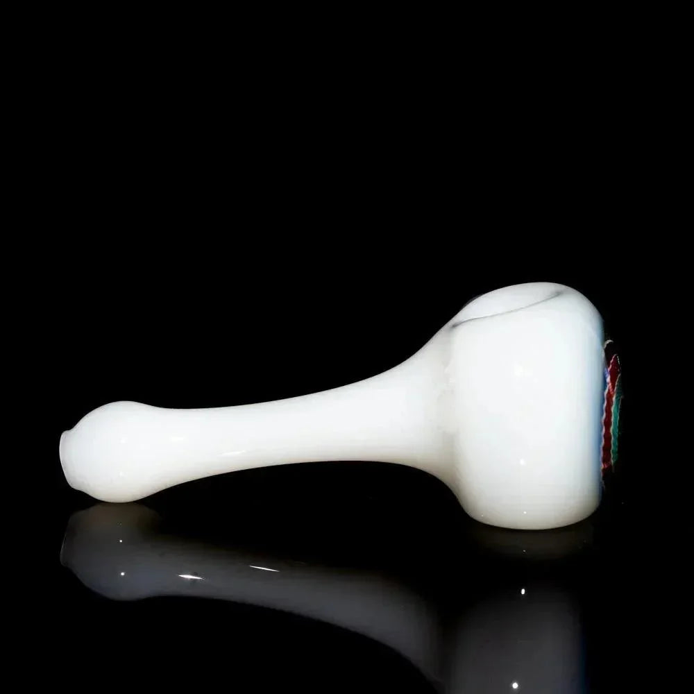 White glass hand pipe with colorful red, blue, and green accent design on bowl
