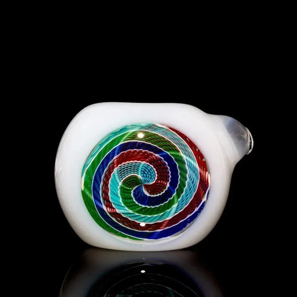 Colorful glass spoon pipe with red, blue, and green spiral design on white base
