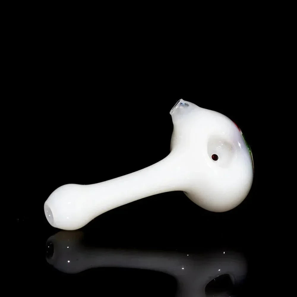 White glass hand pipe with spoon shape on black background