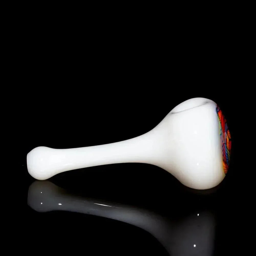 White glass spoon pipe with colorful reticello pattern on bowl, displayed on black background