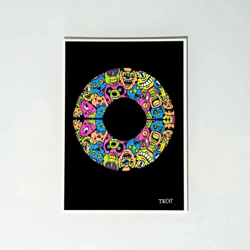 Colorful abstract donut art print with quirky faces on black background