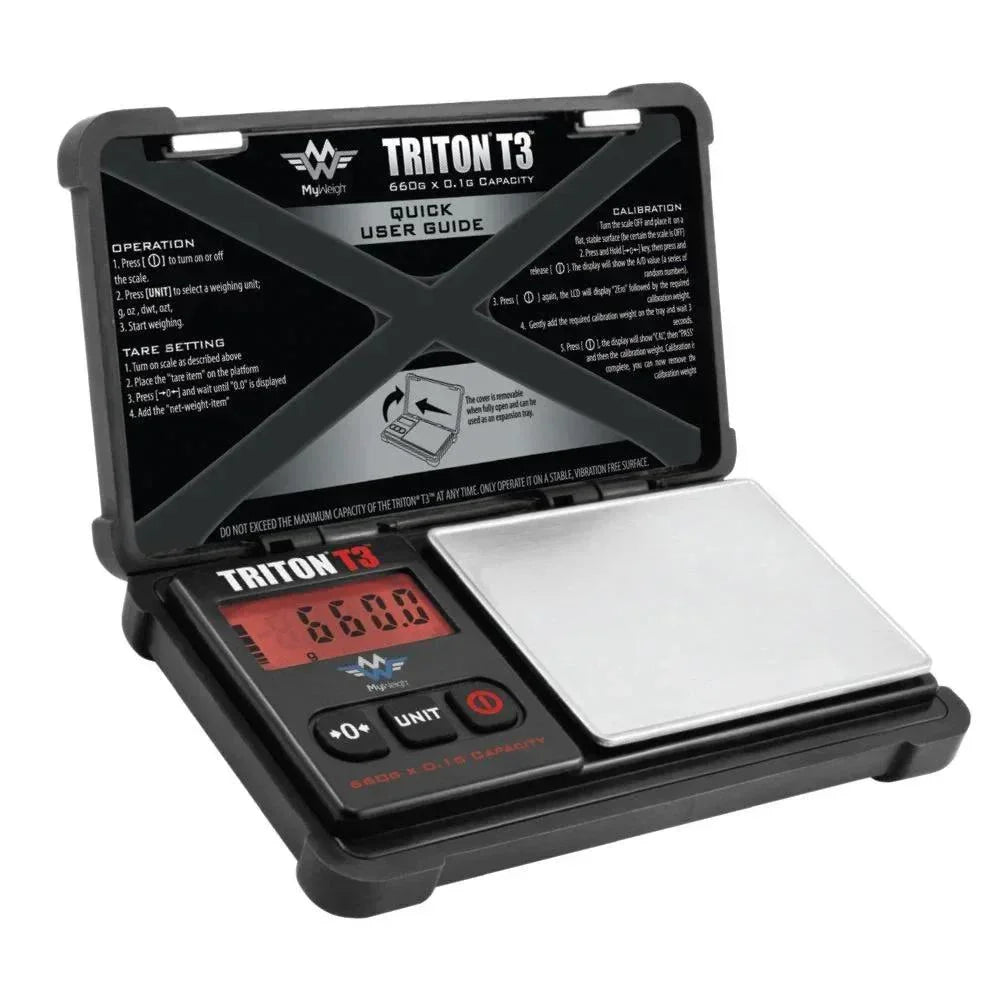 Triton T3 digital pocket scale with backlit LCD, stainless steel platform, and user guide lid.