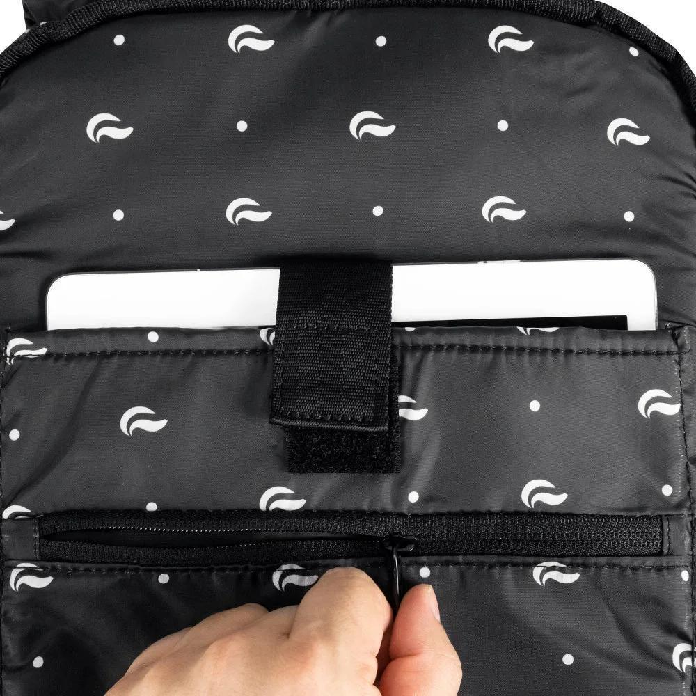Black backpack interior with padded laptop sleeve and hand opening zipper pocket