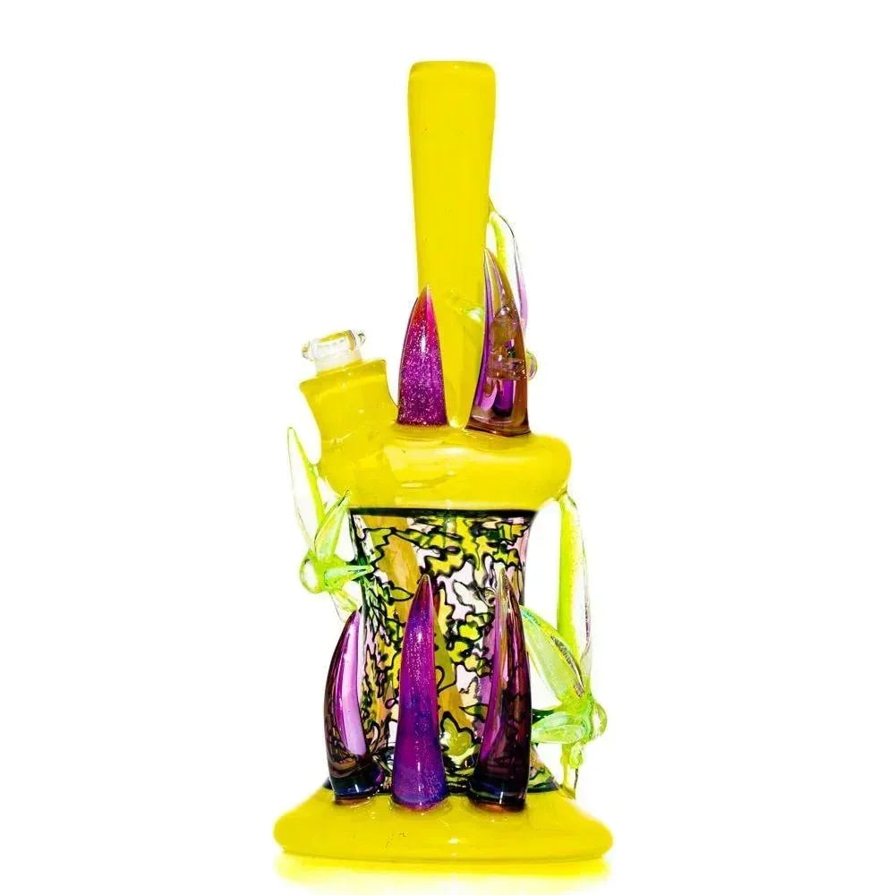 Colorful glass water pipe with yellow, purple, and green accents on a white background.