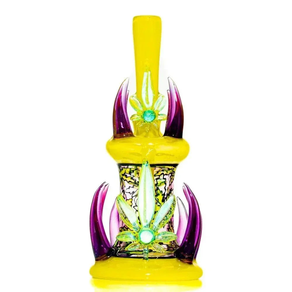 Colorful heady glass water pipe with yellow, purple accents and floral design