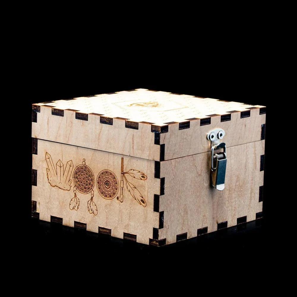 Wooden stash box with engraved crystals, dreamcatchers, feathers, and a metal latch
