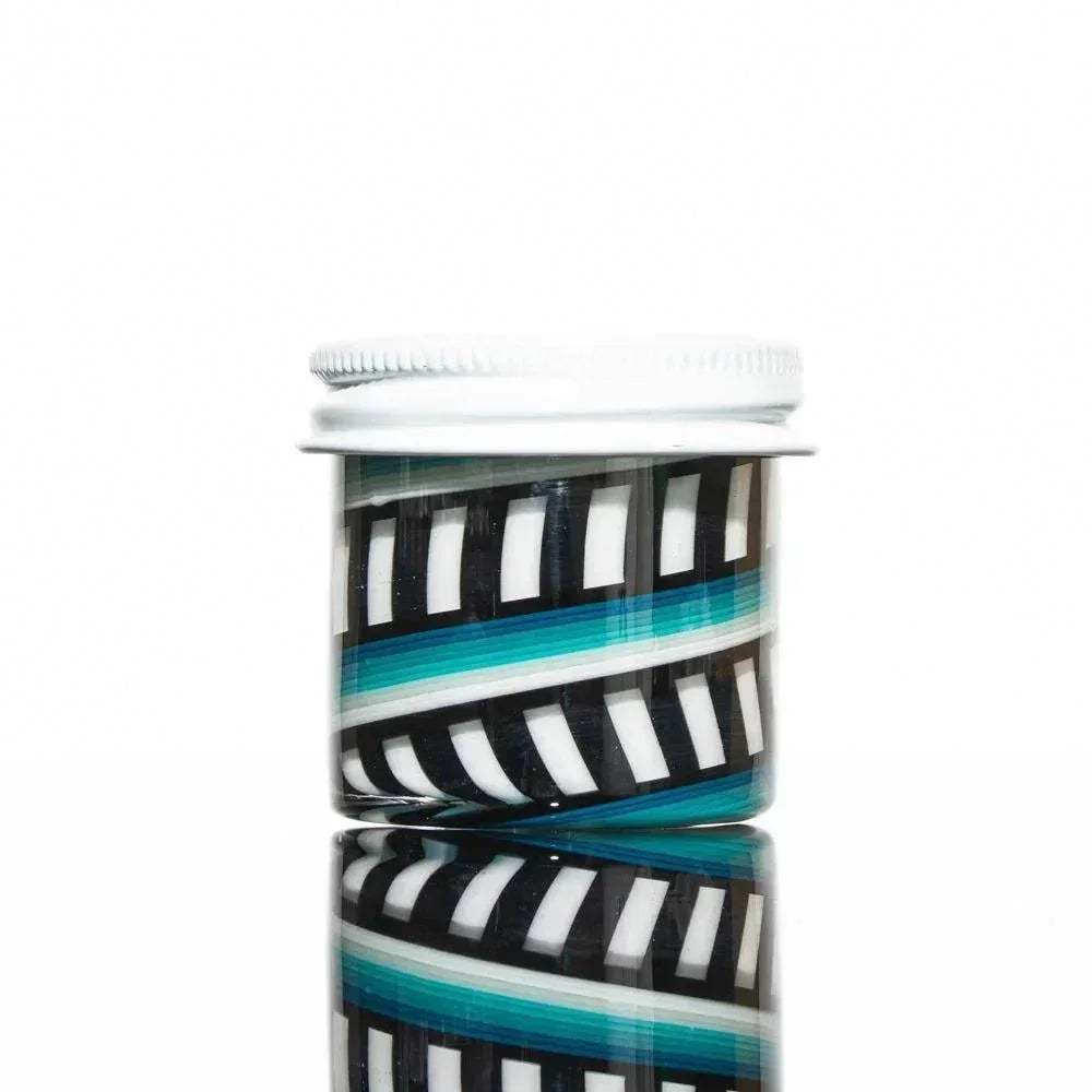 Double layer glass jar with black, white, and blue linework design and white lid