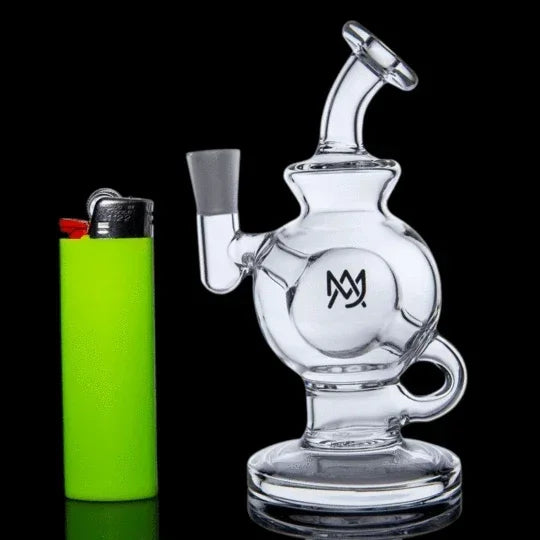 Clear glass mini recycler water pipe with logo next to a neon green lighter on black background.