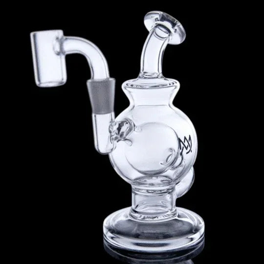 Clear glass recycler dab rig with a banger nail attachment on black background