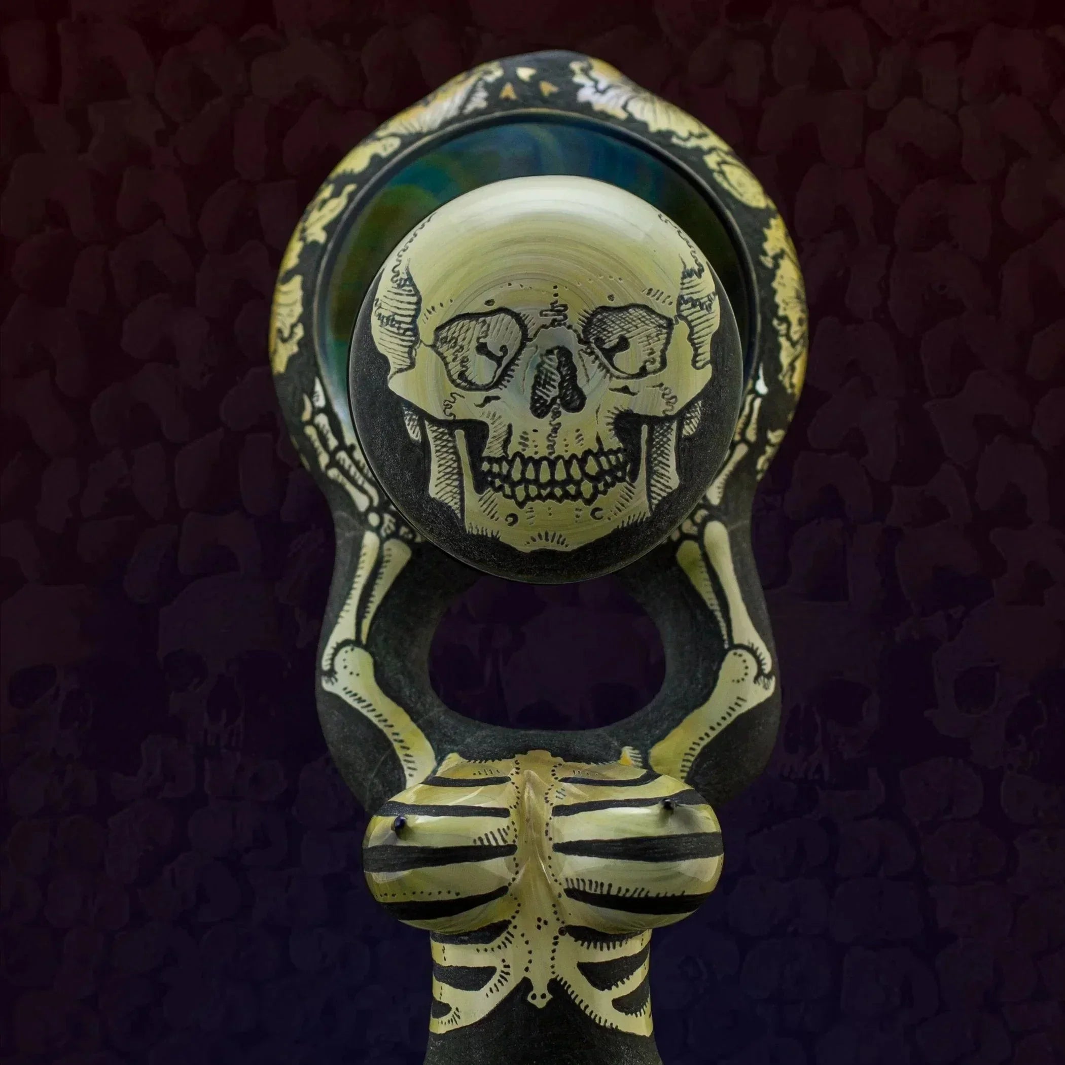 Skull-themed glass pipe with skeleton design, heady glass art for smoking accessories