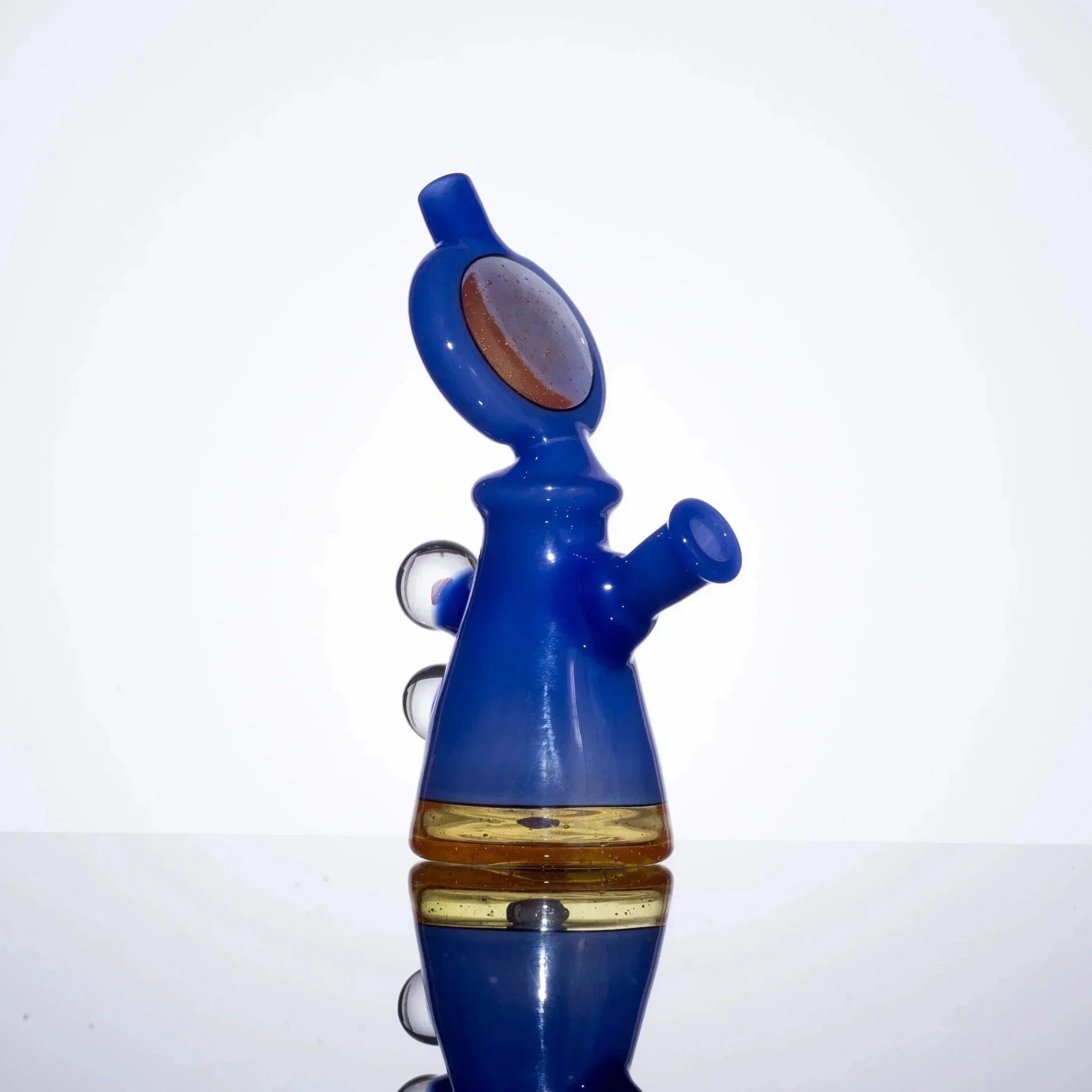 Blue glass pipe with amber accents and bubble details, ideal for heady glass collectors
