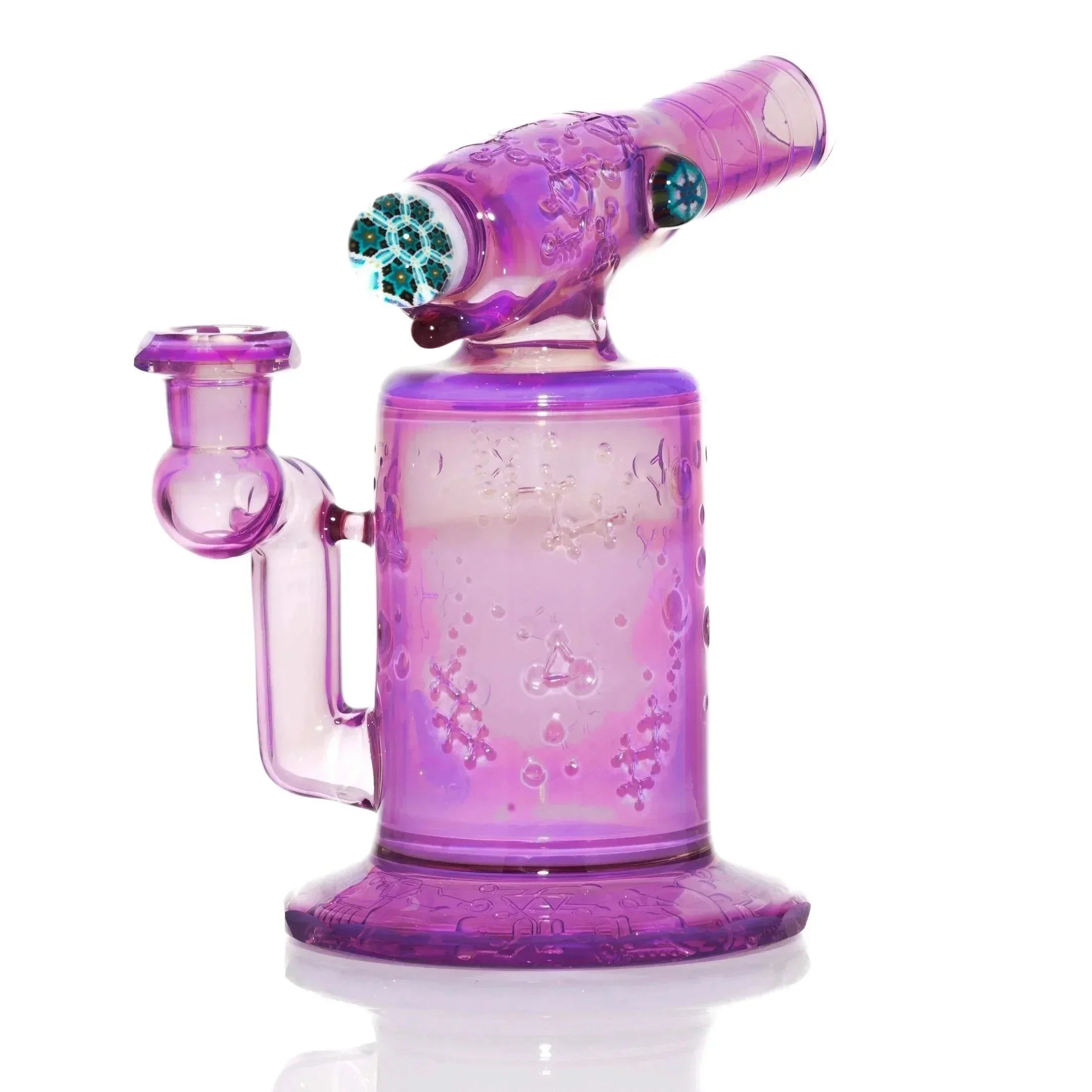 Purple glass water pipe with intricate patterns and a side handle, displayed on white background.
