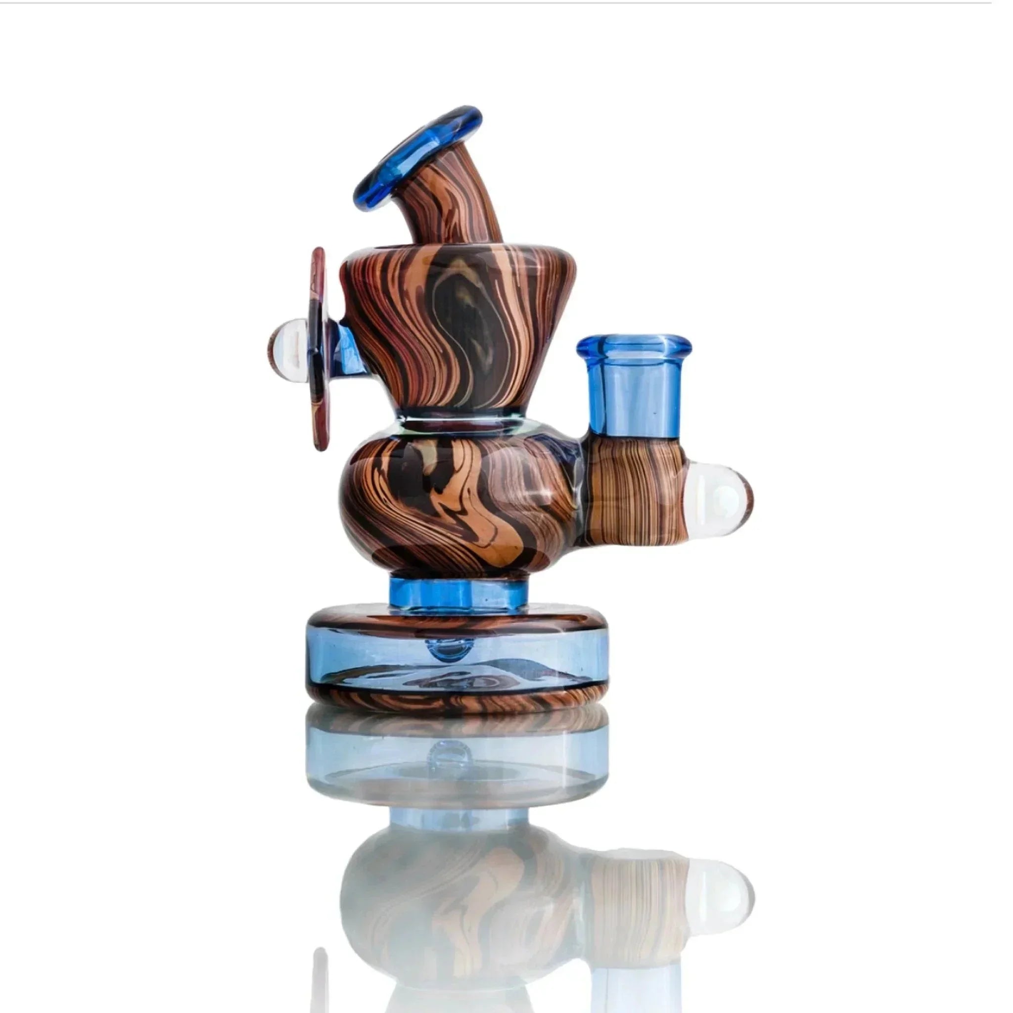 Handblown glass pipe with wood grain swirls and blue accents, featuring a reflective base and dual chambers.