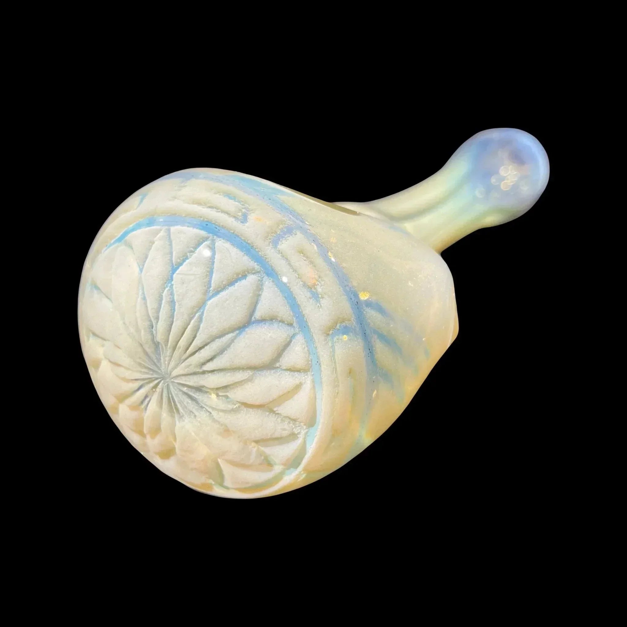 Opalescent glass hand pipe with intricate floral pattern etched on bowl, displayed on black background