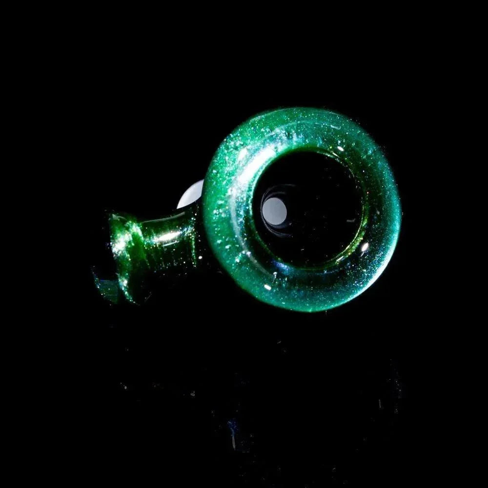 Green sparkly glass hand pipe with rounded bowl on black background