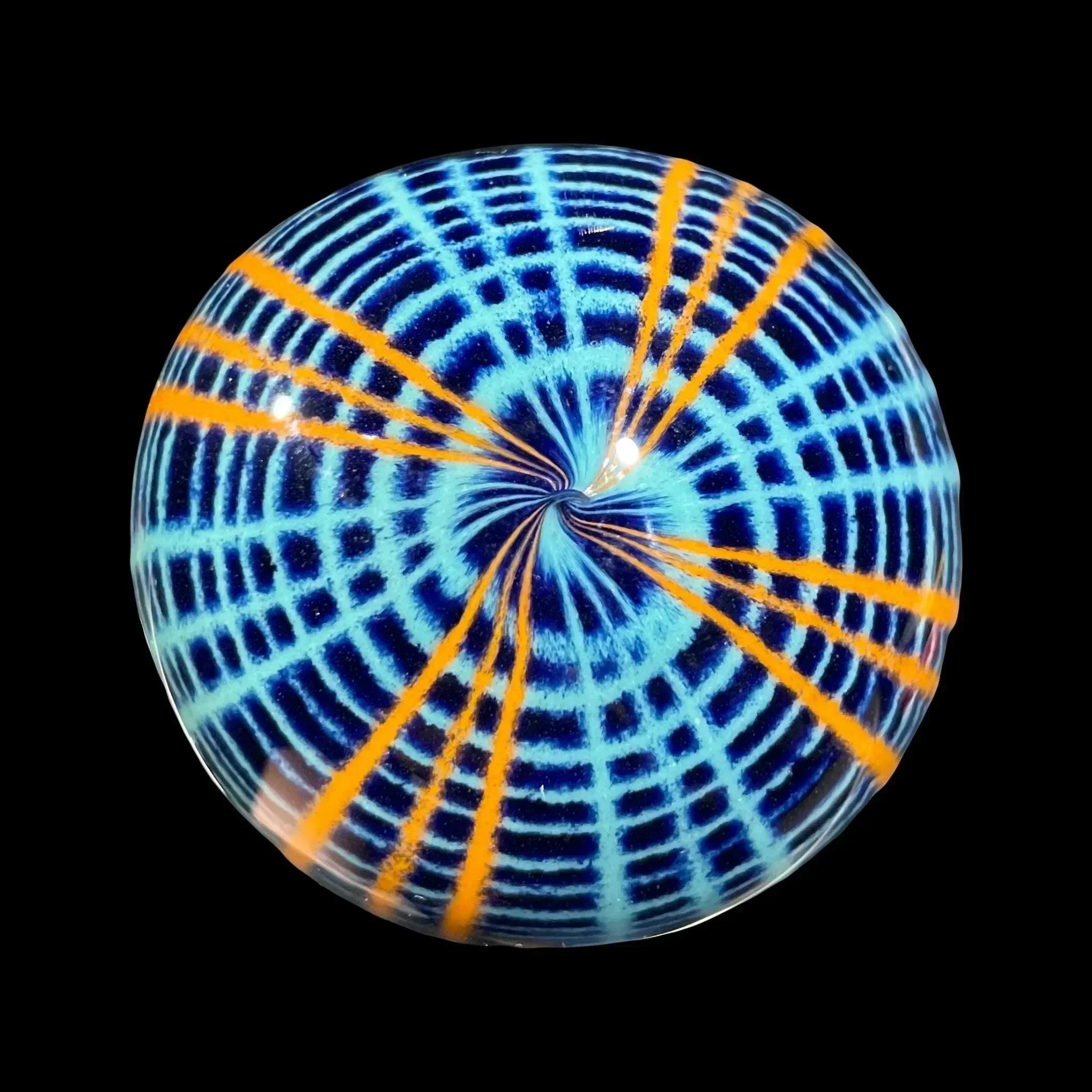 Colorful glass marble with blue, orange, and black spiral grid pattern on black background