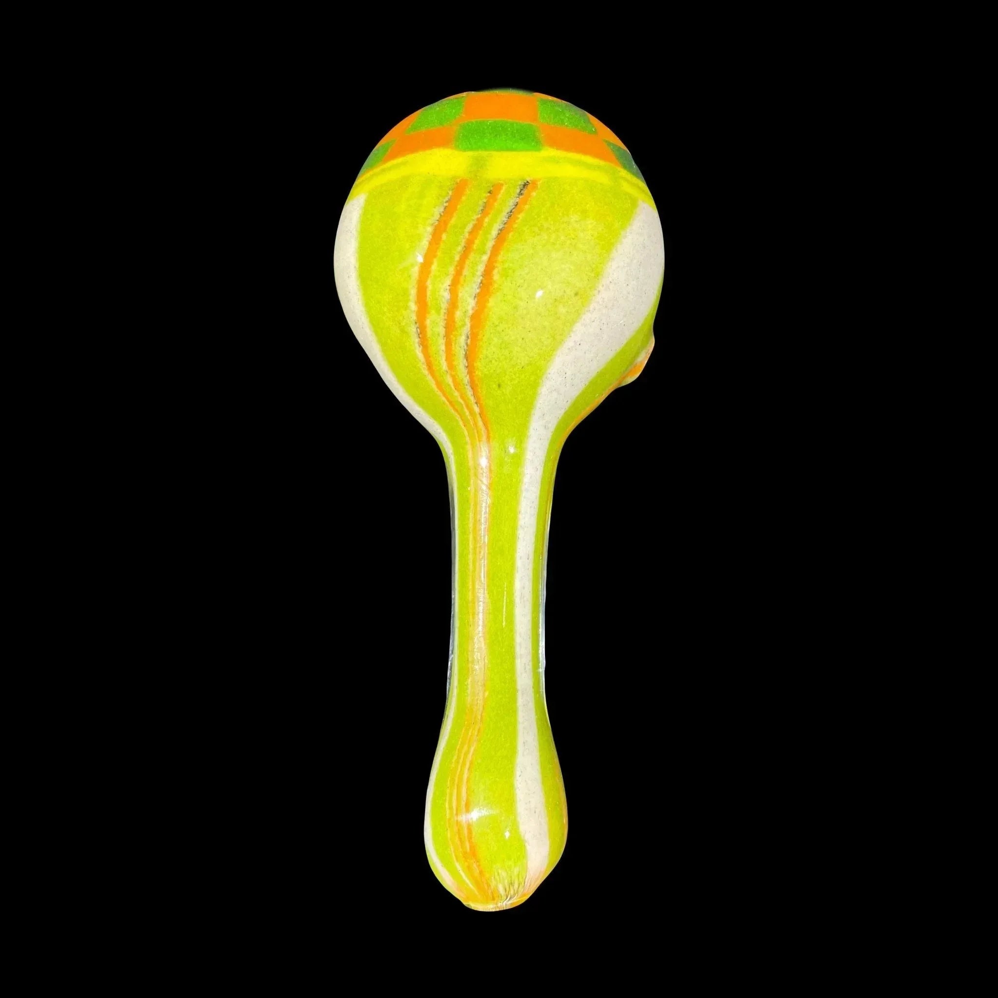 Colorful glass hand pipe with green, orange, and yellow patterns on a black background