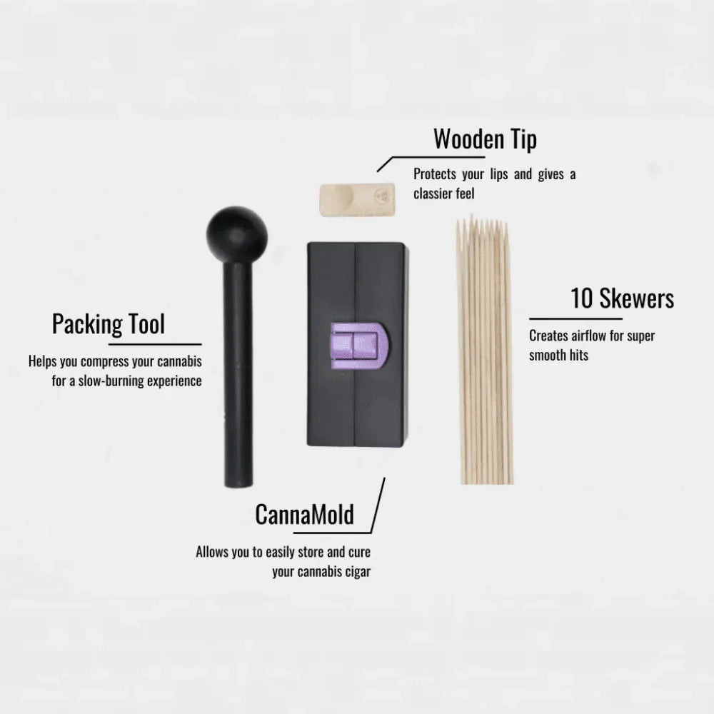 Canna cigar kit with black packing tool, CannaMold, wooden tip, and 10 bamboo skewers.