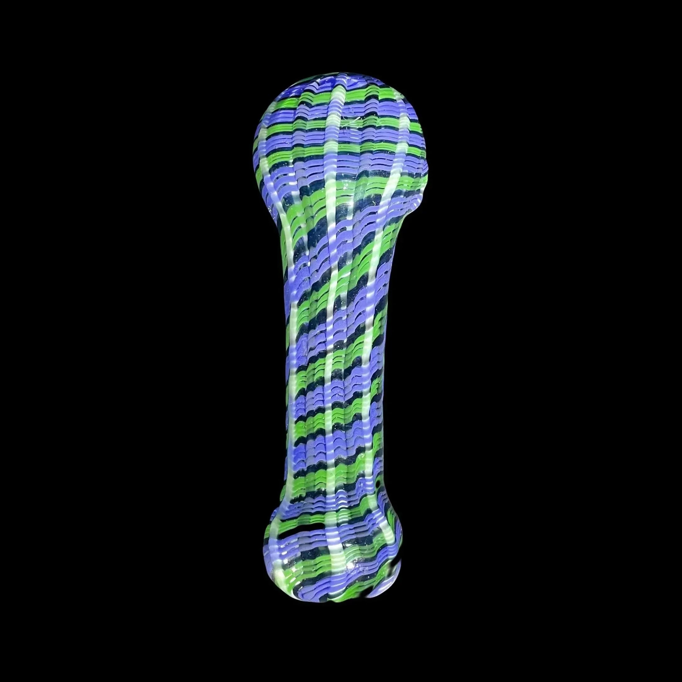 Colorful glass hand pipe with blue, green, and black swirl pattern on a black background.