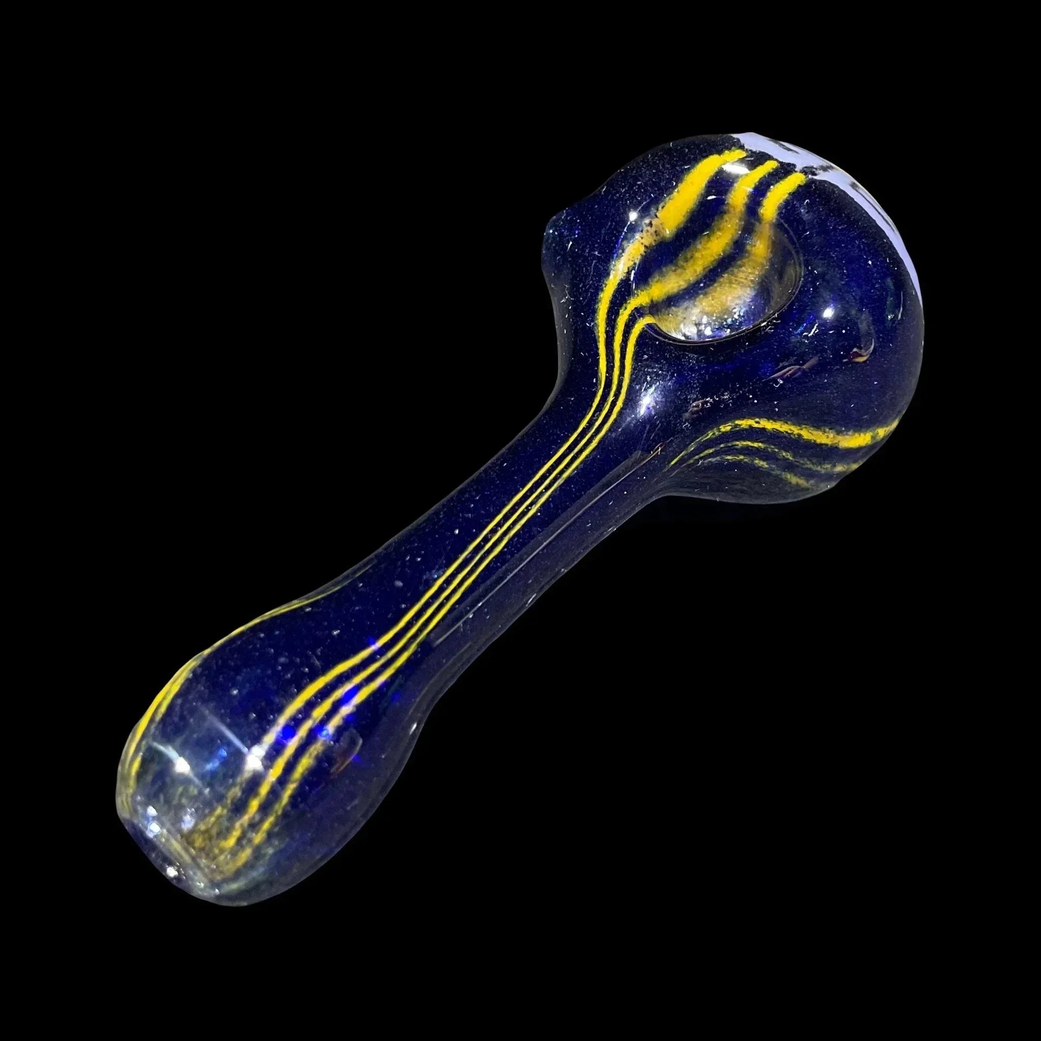 Blue glass hand pipe with yellow swirl accents on a black background