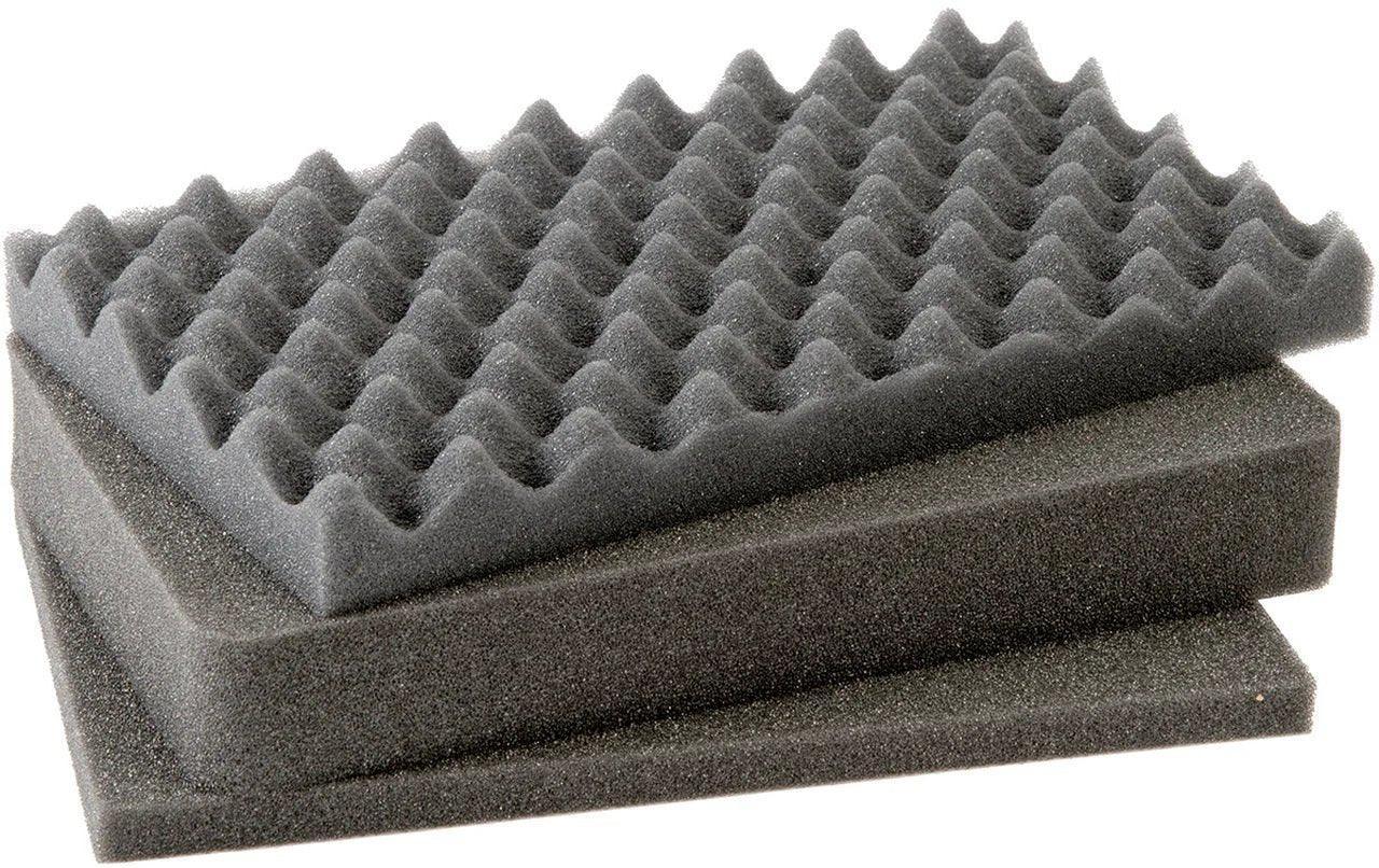 Black foam inserts with egg crate texture for protective case padding and cushioning.
