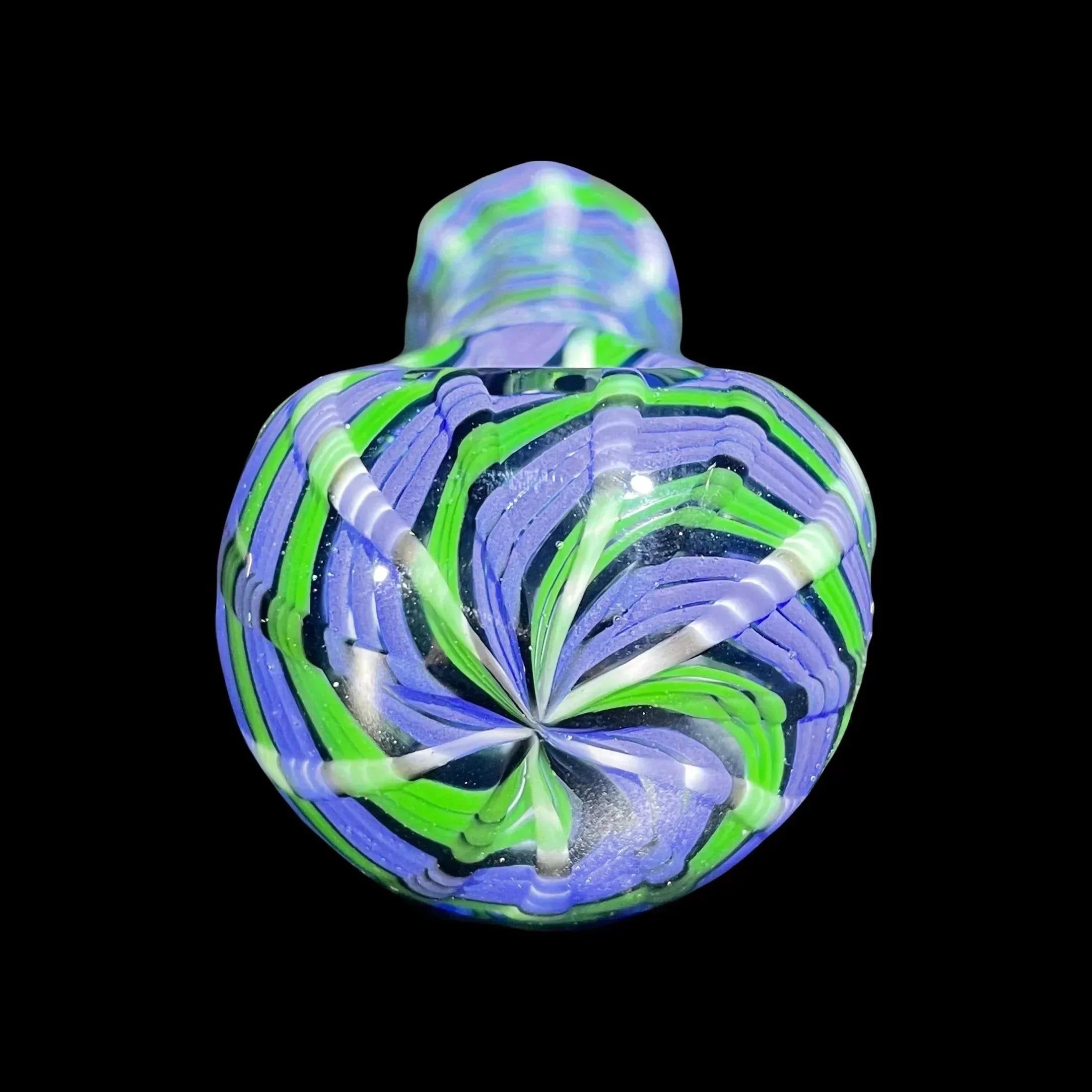 Hand-blown glass pipe with vibrant green, blue, and white swirl pattern on black background.