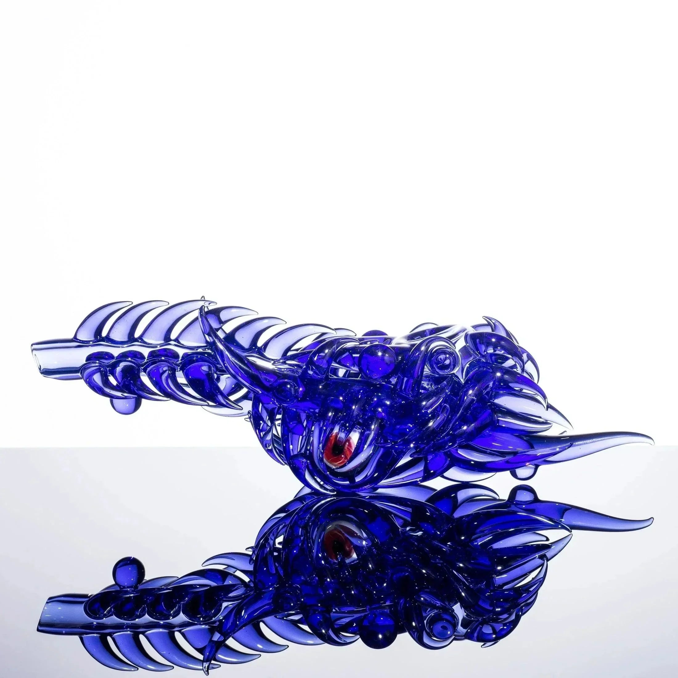 Blue dragon glass pipe with red eye, intricate heady glass art for collectors