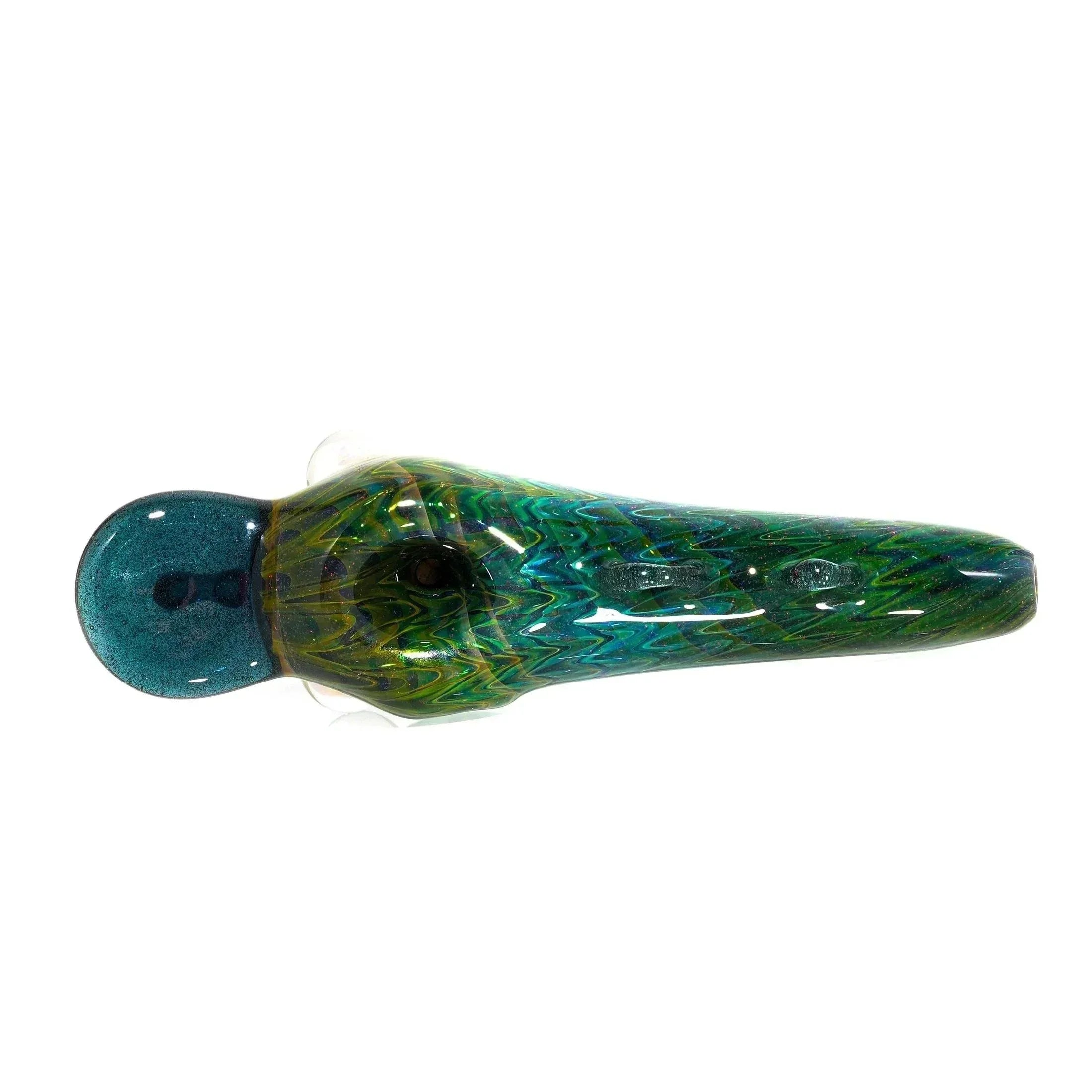 Colorful glass hand pipe with green and blue zigzag pattern on white background
