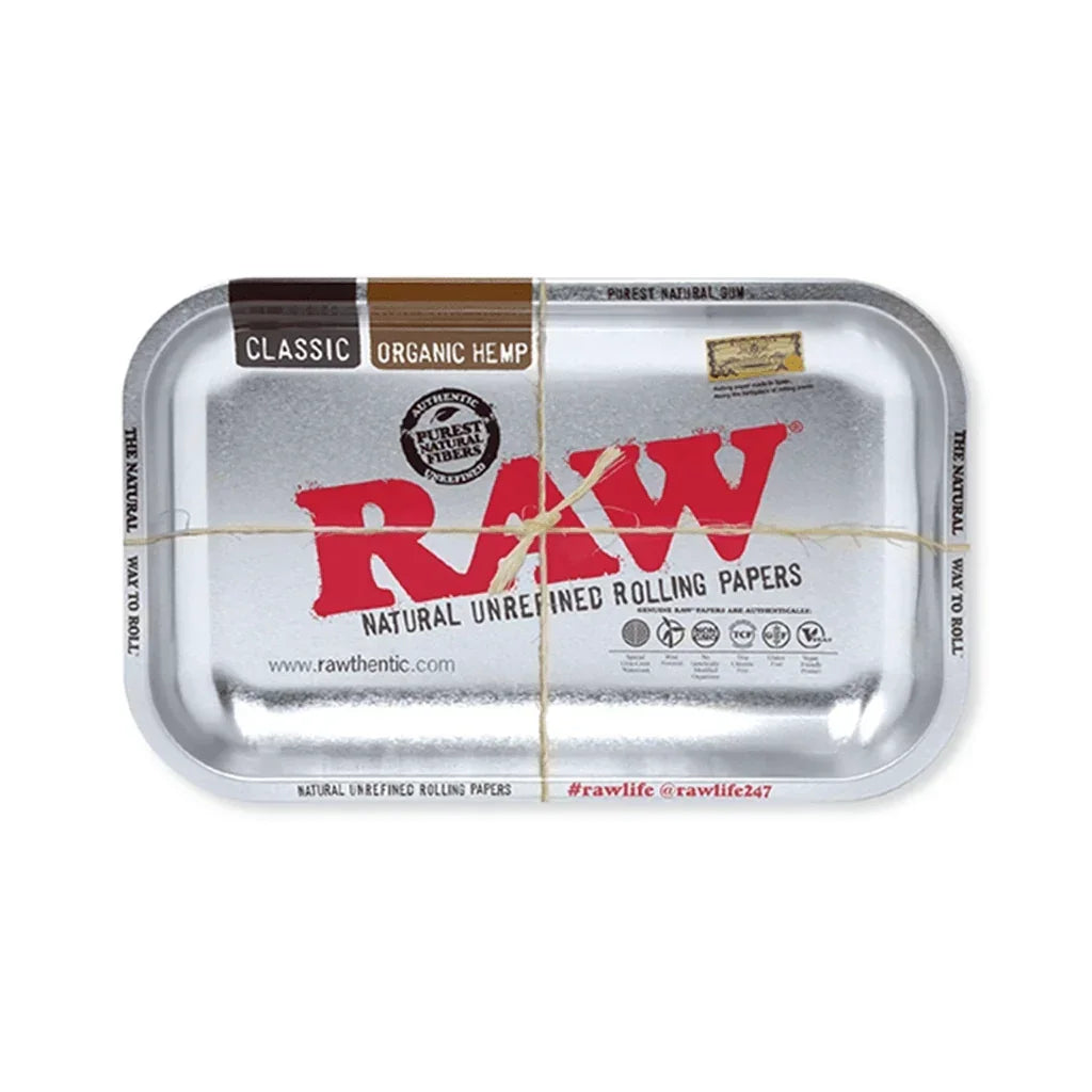Small metallic rolling tray featuring RAW natural unrefined rolling papers branding.