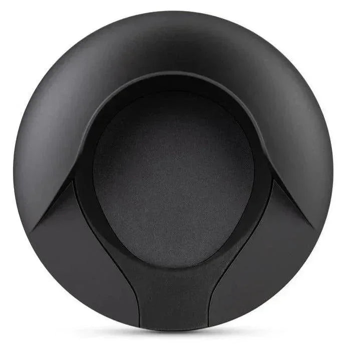 Black Puffco vaporizer charging dock with sleek circular design for concentrate devices