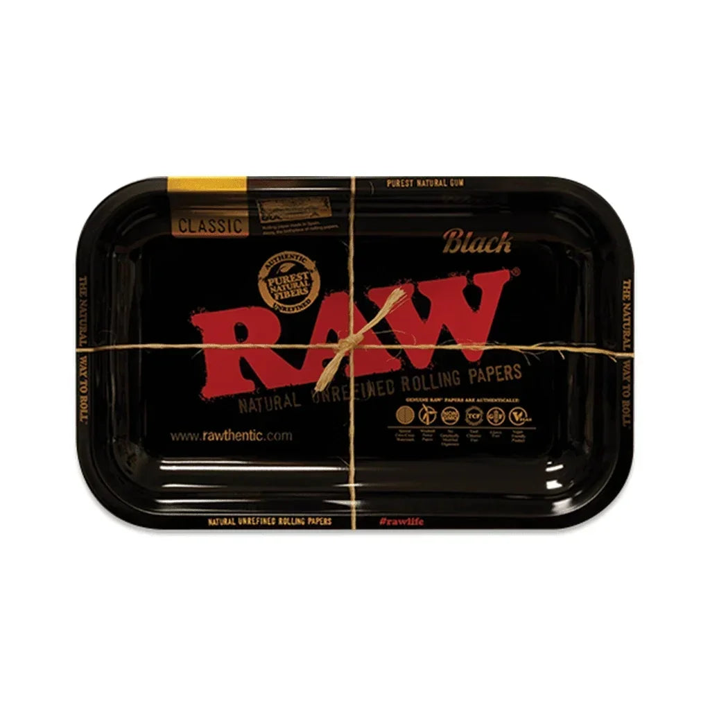 Black RAW rolling tray with red logo, gold accents, and twine for organizing smoking accessories