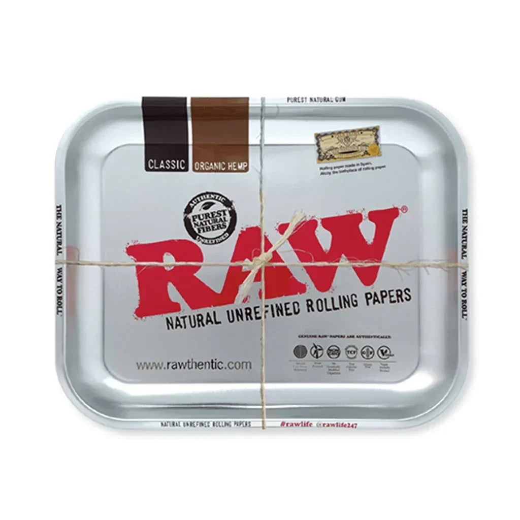 RAW metal rolling tray with red logo and natural hemp accents, used for preparing papers