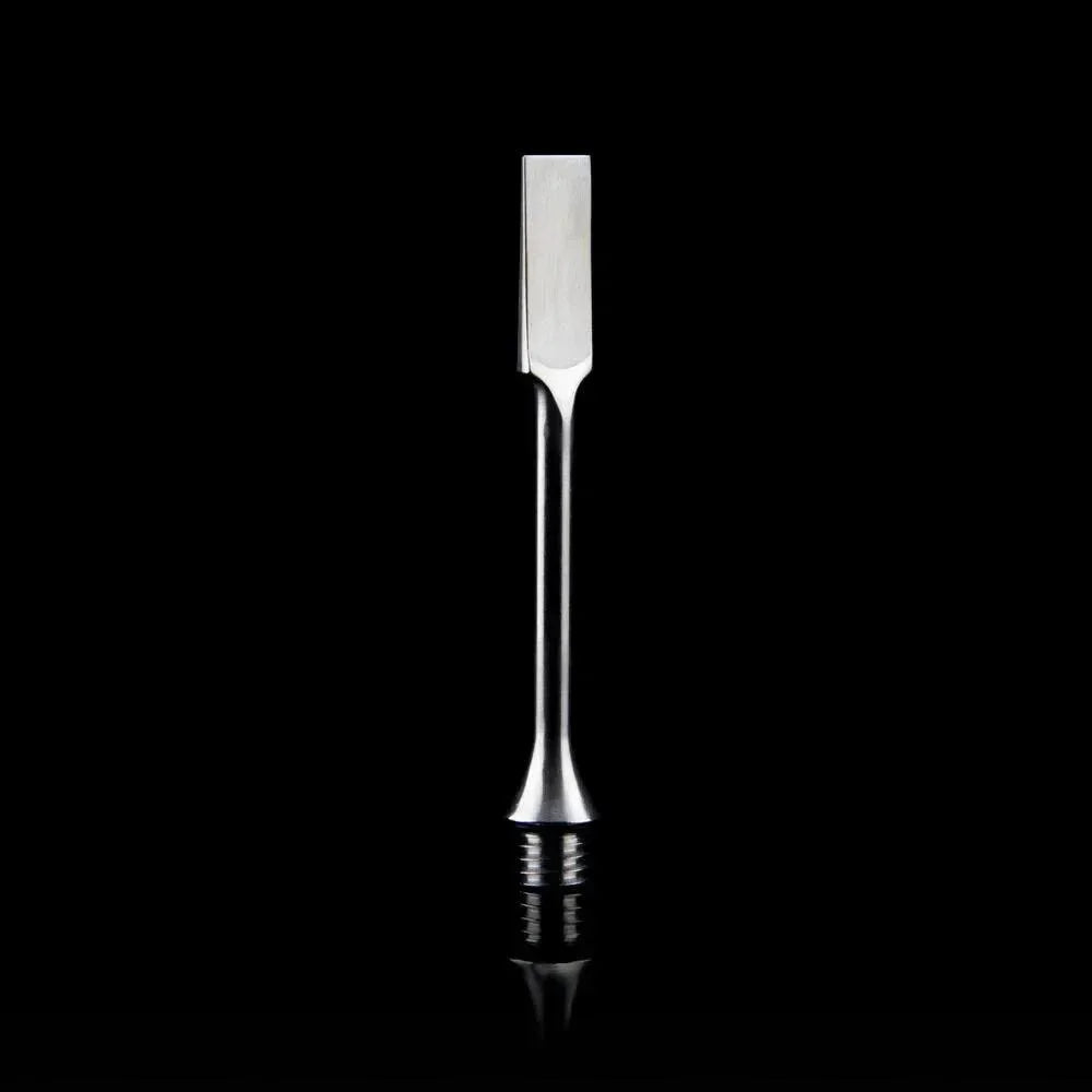 Stainless steel dab tool with flat tip on black background