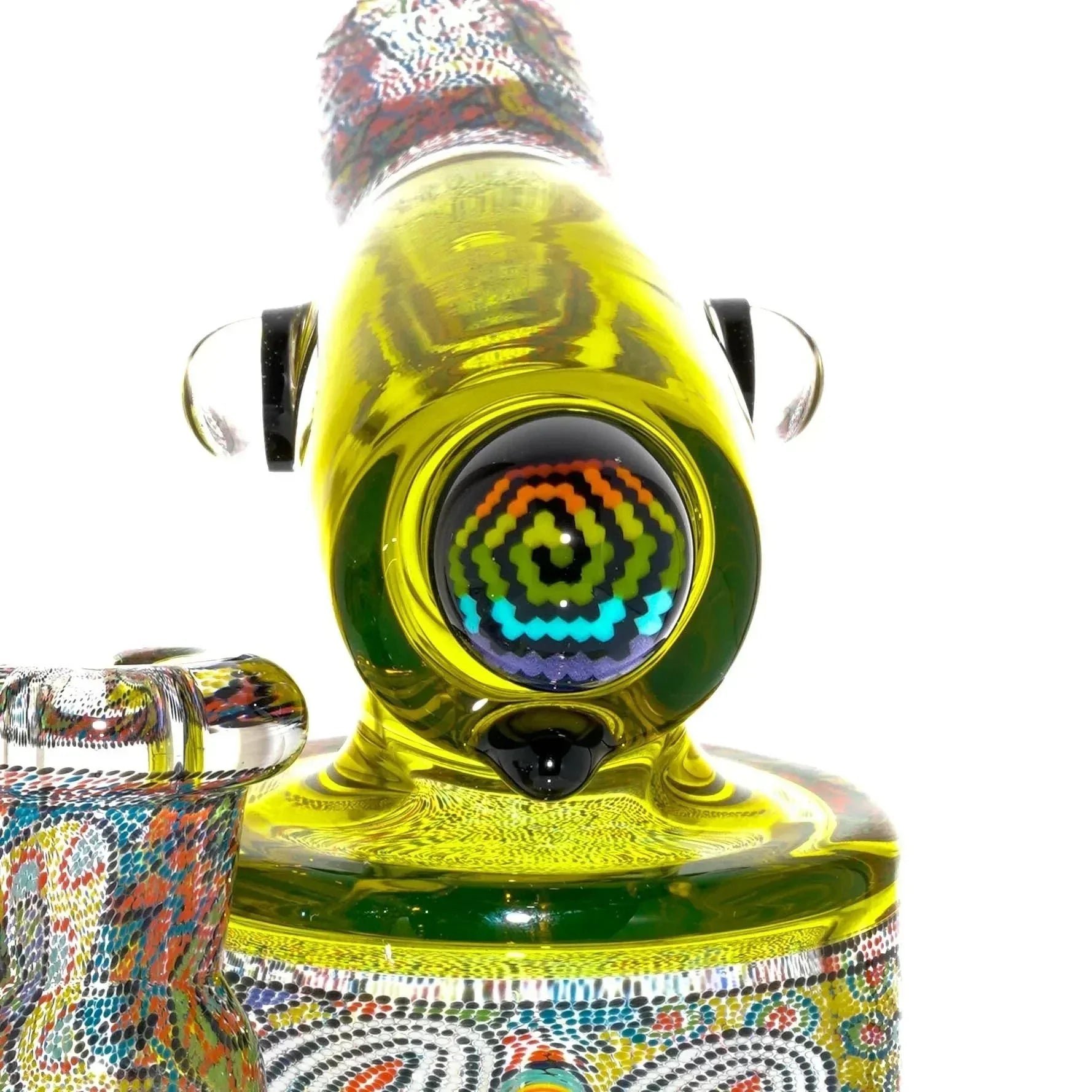 Colorful heady glass rig with intricate patterns and a vibrant spiral accent