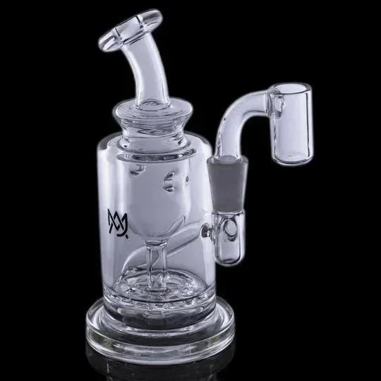 Clear glass water pipe with angled mouthpiece and quartz banger attachment on black background