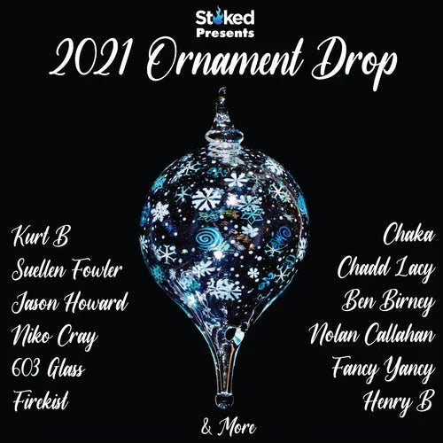 Hand-blown glass ornament with blue snowflake designs, featured in 2021 ornament drop.