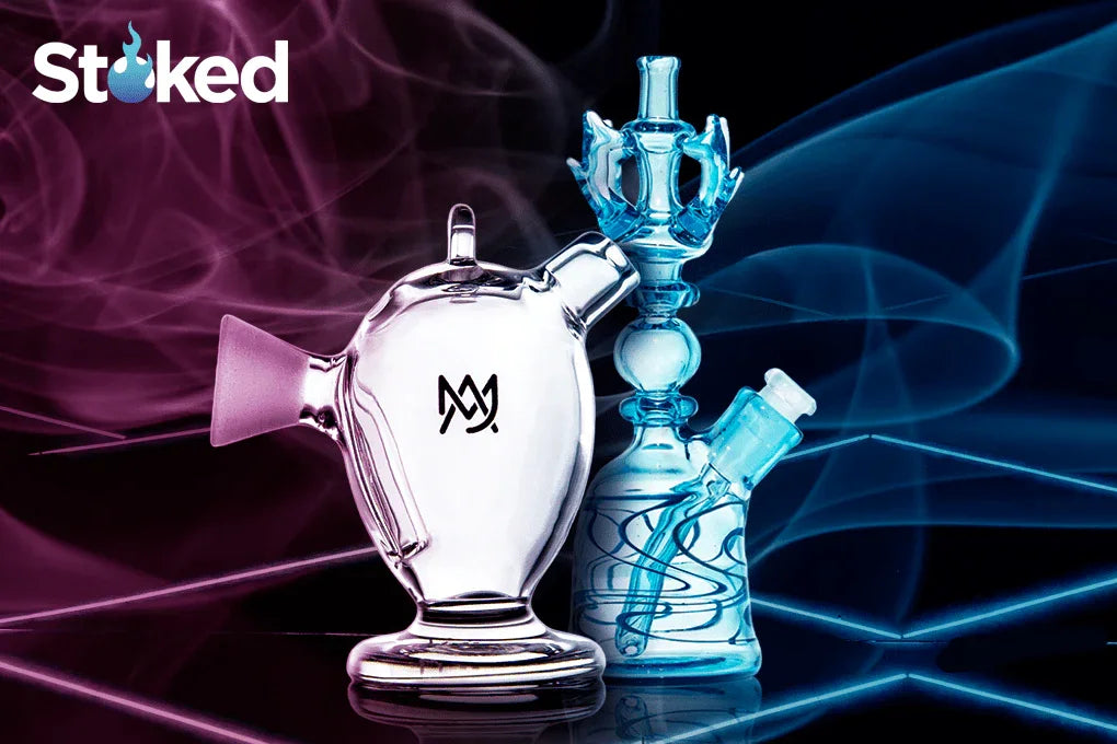 Artistic glass water pipes with colorful smoke, featuring intricate designs and a modern vibe