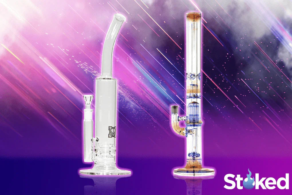 Two glass water pipes with intricate designs on a vibrant purple and pink background.