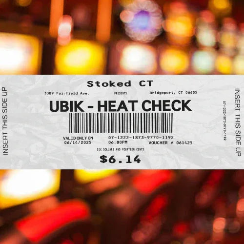Concert or event ticket with bold text 'UBIK - HEAT CHECK' over a blurred background of colorful lights