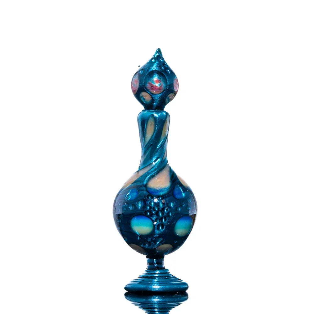 Unique blue heady glass art piece with bulbous base and intricate swirled design on white background