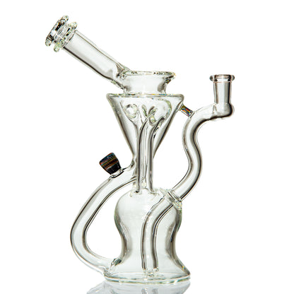 Clear scientific glass water pipe with intricate recycler design on white background