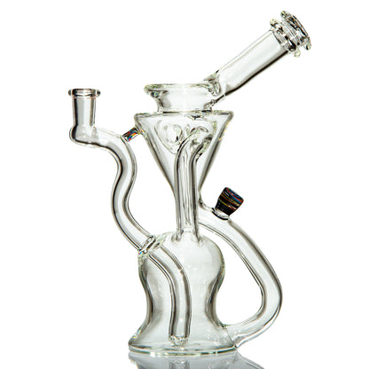 Clear glass recycler water pipe with intricate curved tubing on white background