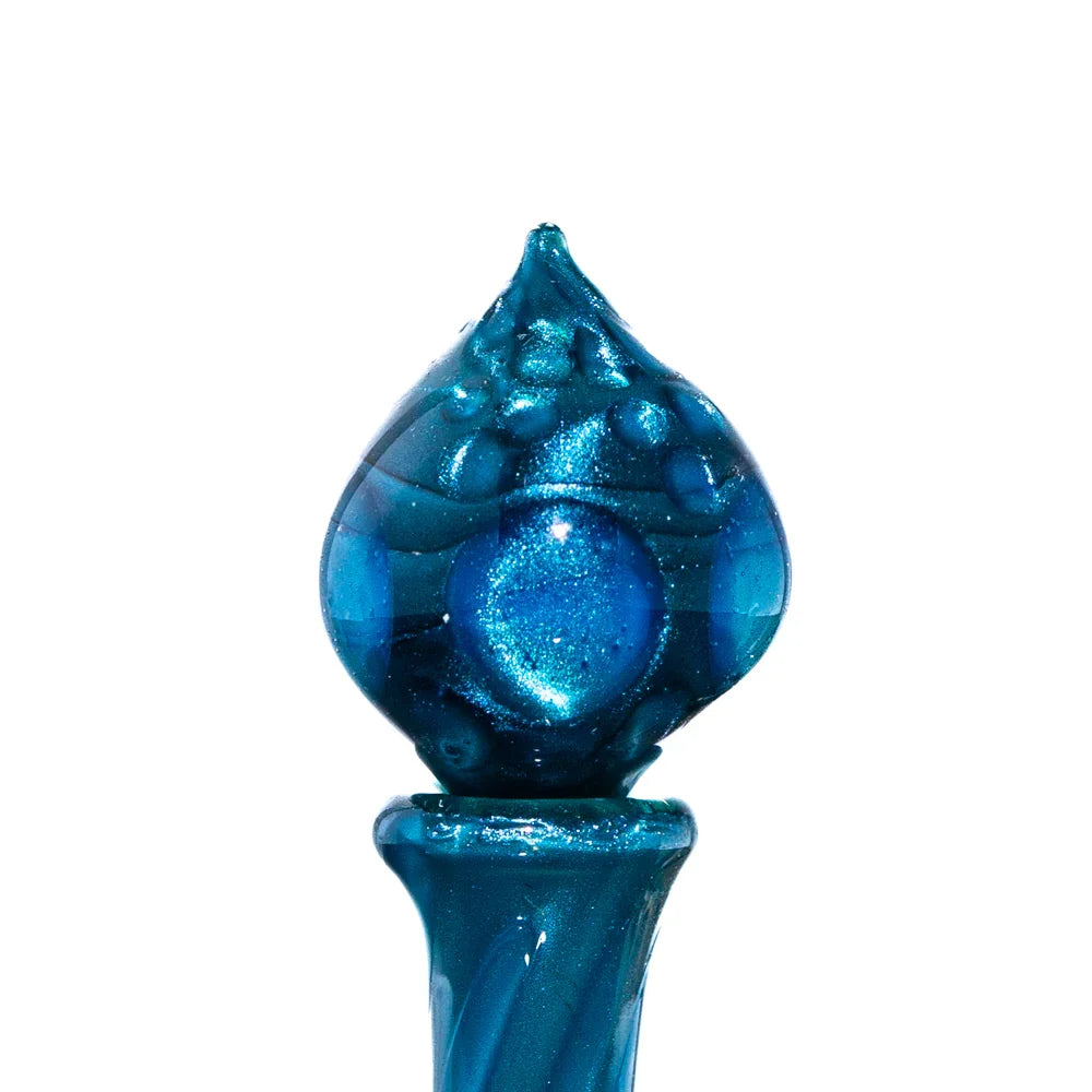 Blue glass carb cap with textured bubble accents for dab rigs on white background