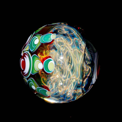 Colorful heady glass marble with vibrant patterns and intricate swirls on black background