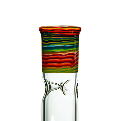 Clear glass bong with vibrant red, green, and yellow striped mouthpiece detail