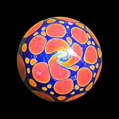 Heady glass marble with blue base and orange swirl dot pattern, artisan smoking accessory