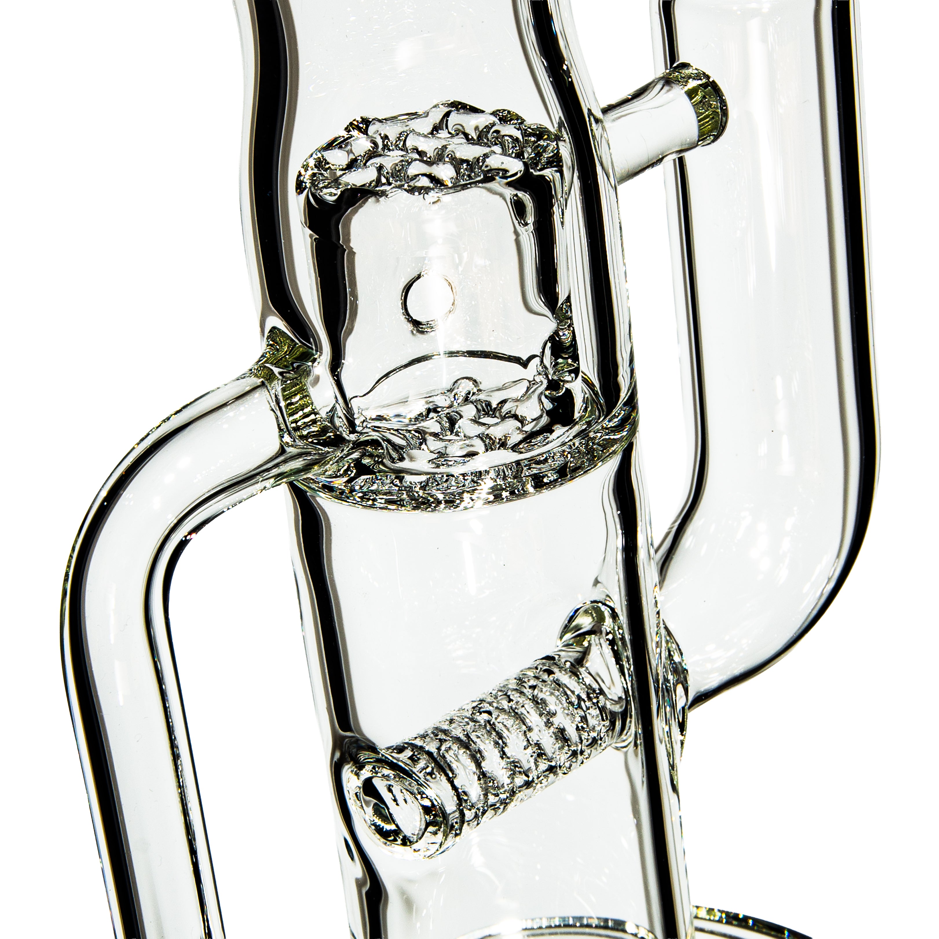 Close-up of clear glass water pipe with intricate percolator and coiled glass detail