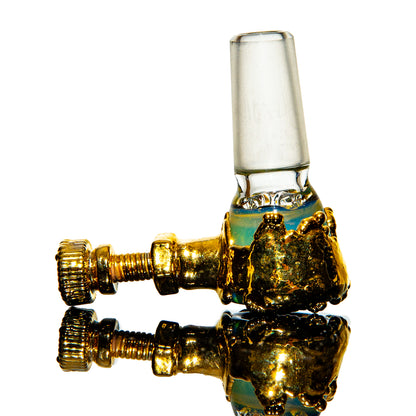 Gold and glass bowl piece for water pipe with metallic hardware on white background