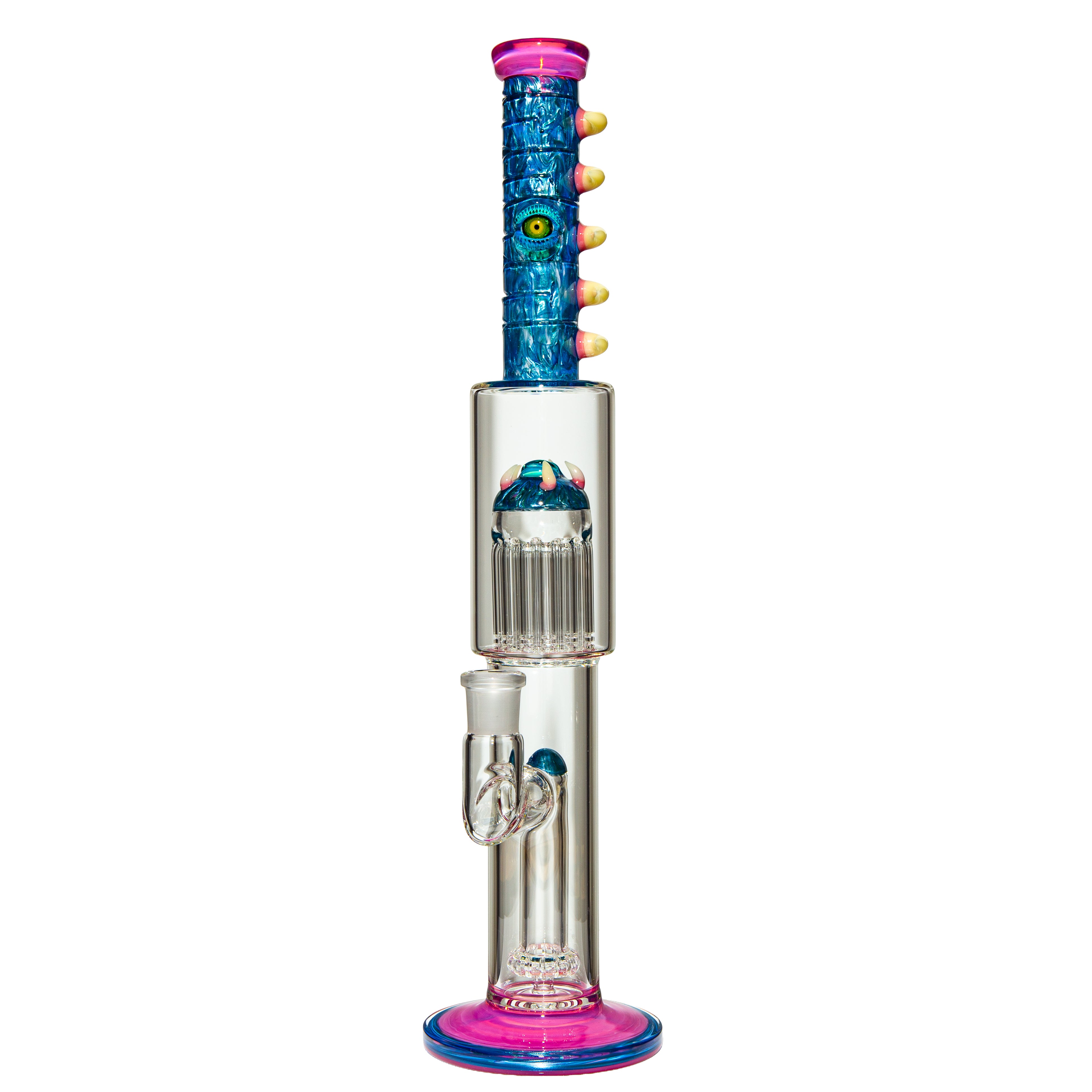 Colorful heady glass water pipe with unique monster-themed details and clear chamber